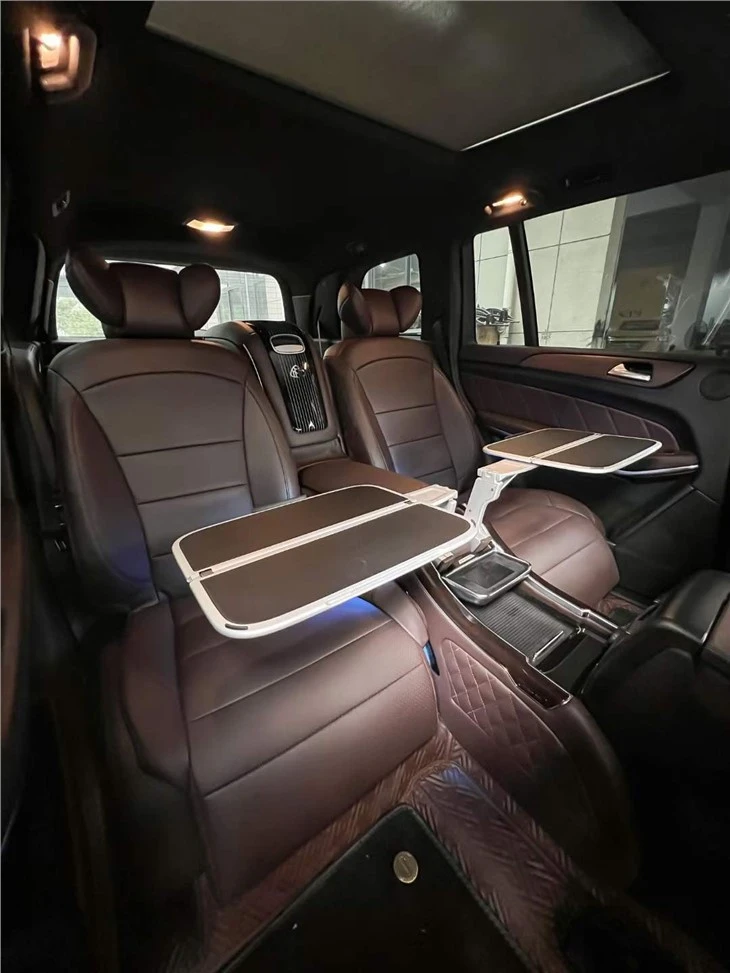 Two folding tables built into the center console